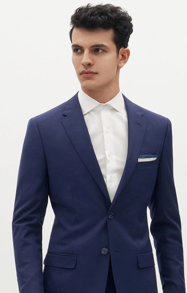 Royal blue men's suit jacket product bust.